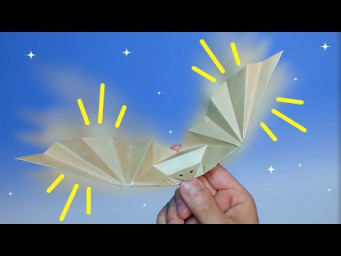 The bat is flapping its wings. 