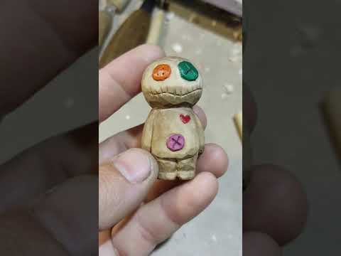 Wood carving and a little voodoo man made of wood with his own hands Wood carving and a little voodoo man made of wood with his own hands