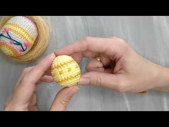 Watch the video on how to embroider an egg.
